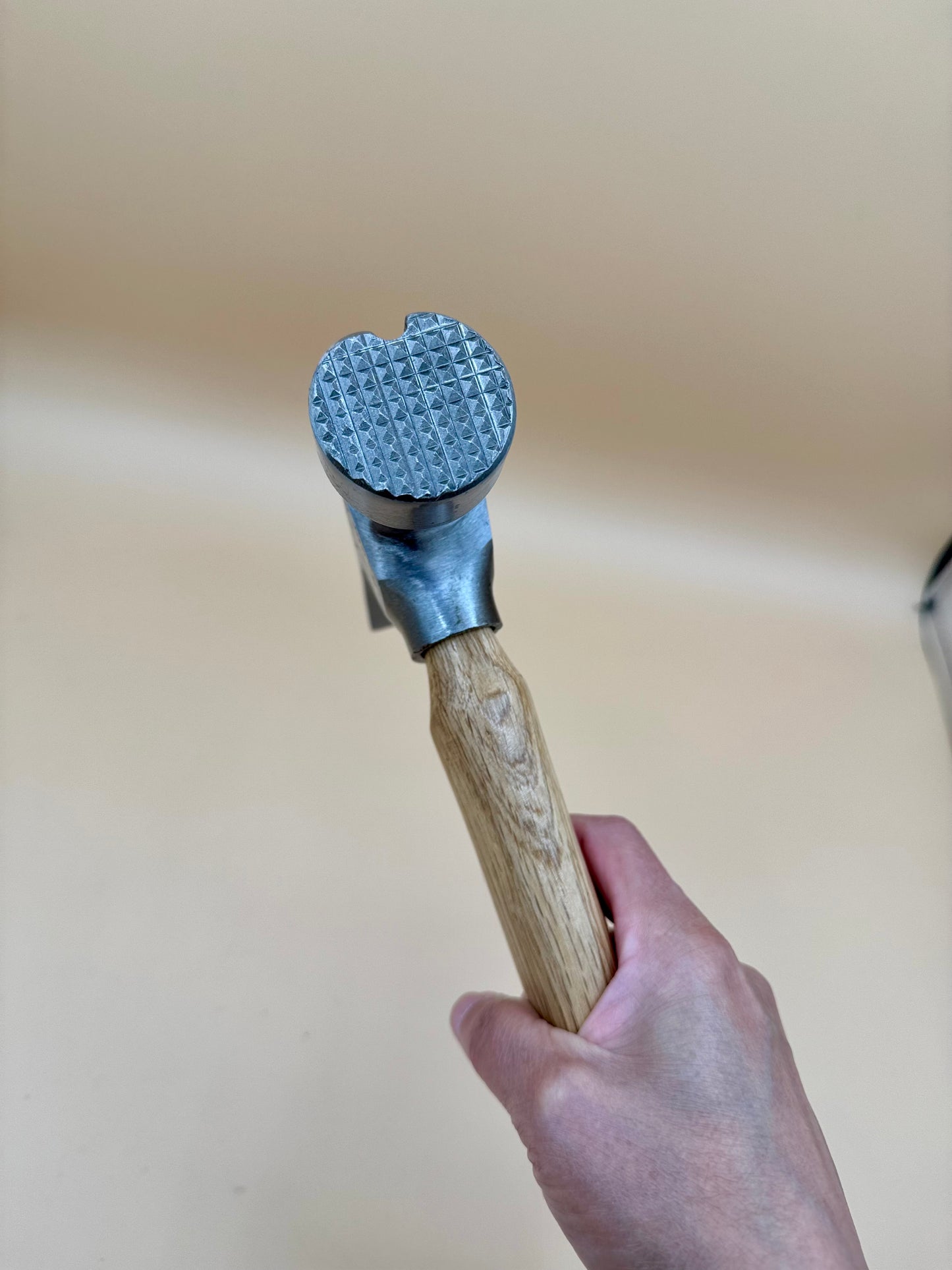 Man of God Laser Engraved Hickory Camp Hatchet (Deuteronomy 31:6) - Close-up of textured steel hammer striking face and hardwood handle — His Word Designs
