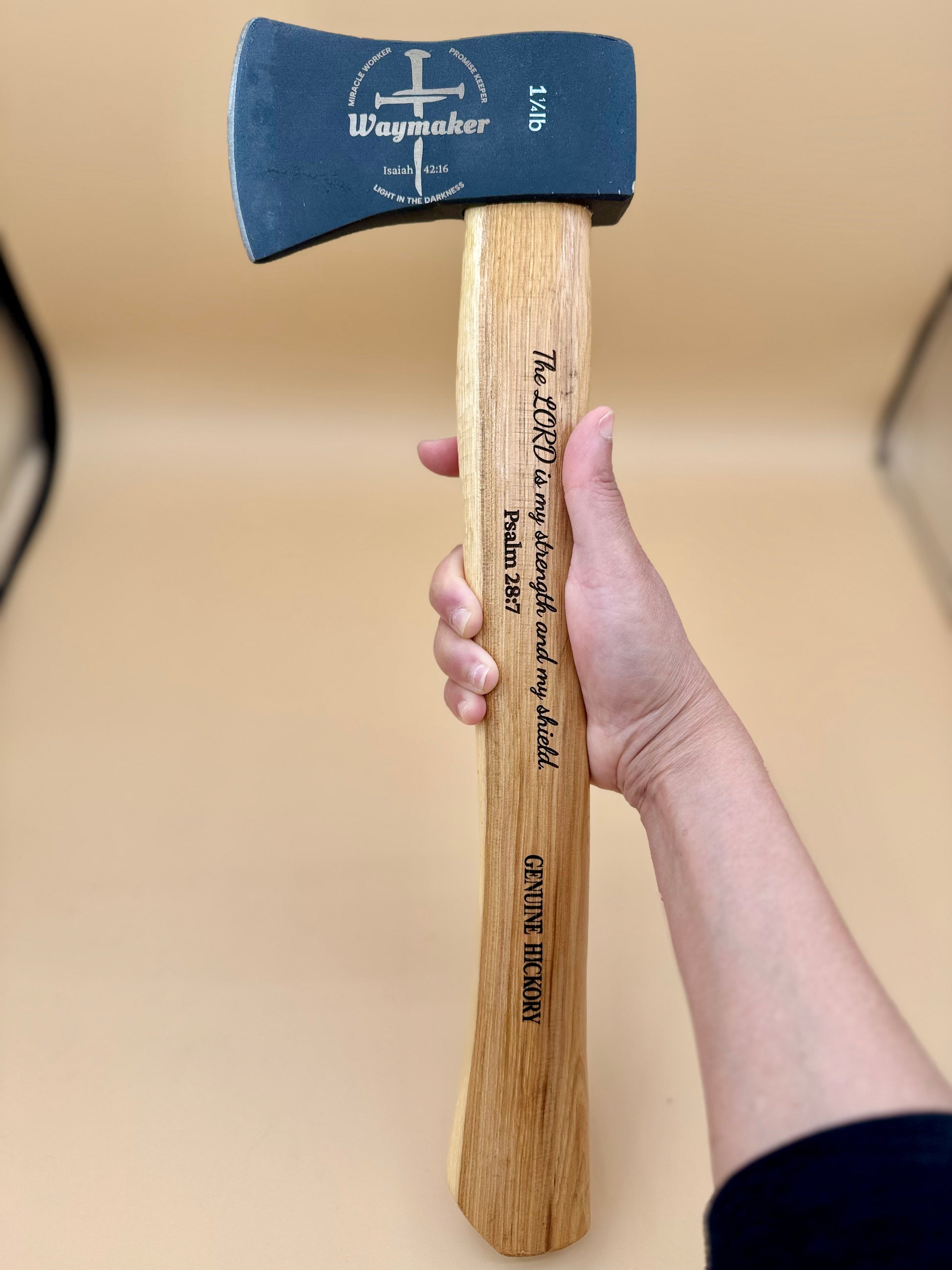 Waymaker Cross Laser Engraved Hickory Camp Hatchet (Psalm 28:7) - Handheld Waymaker cross hickory camp hatchet showing Psalm 28:7 engraving — His Word Designs