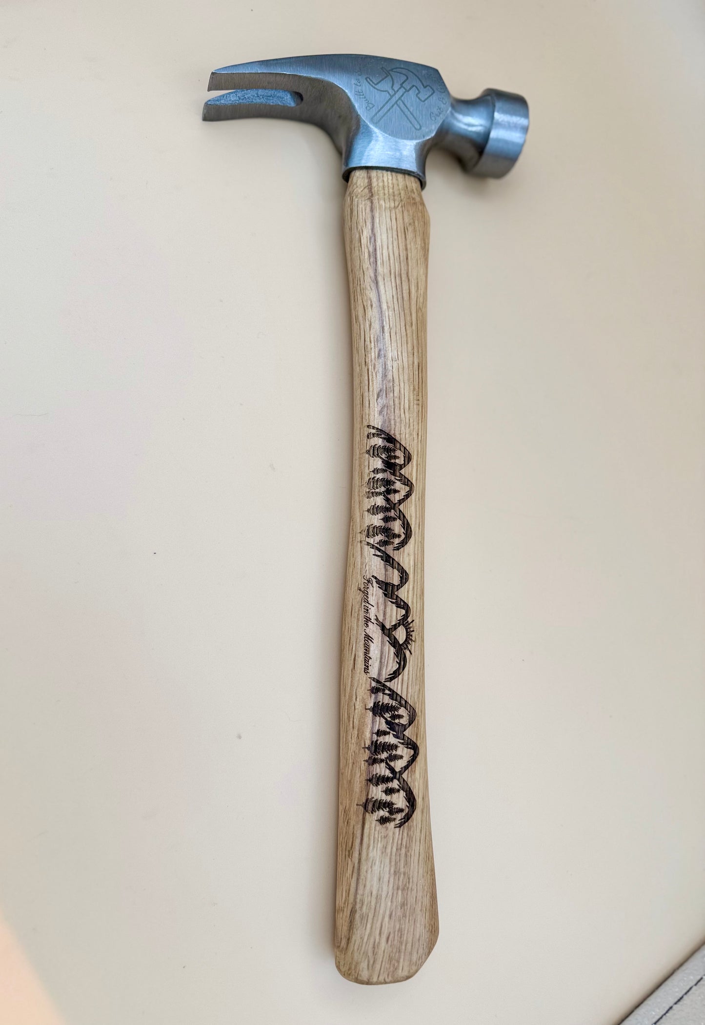 Forged in the Mountains Engraved Claw Hammer - Mountain Pine Edition - Forged in the Mountains claw hammer with mountain pine engraving on hardwood handle — His Word Designs