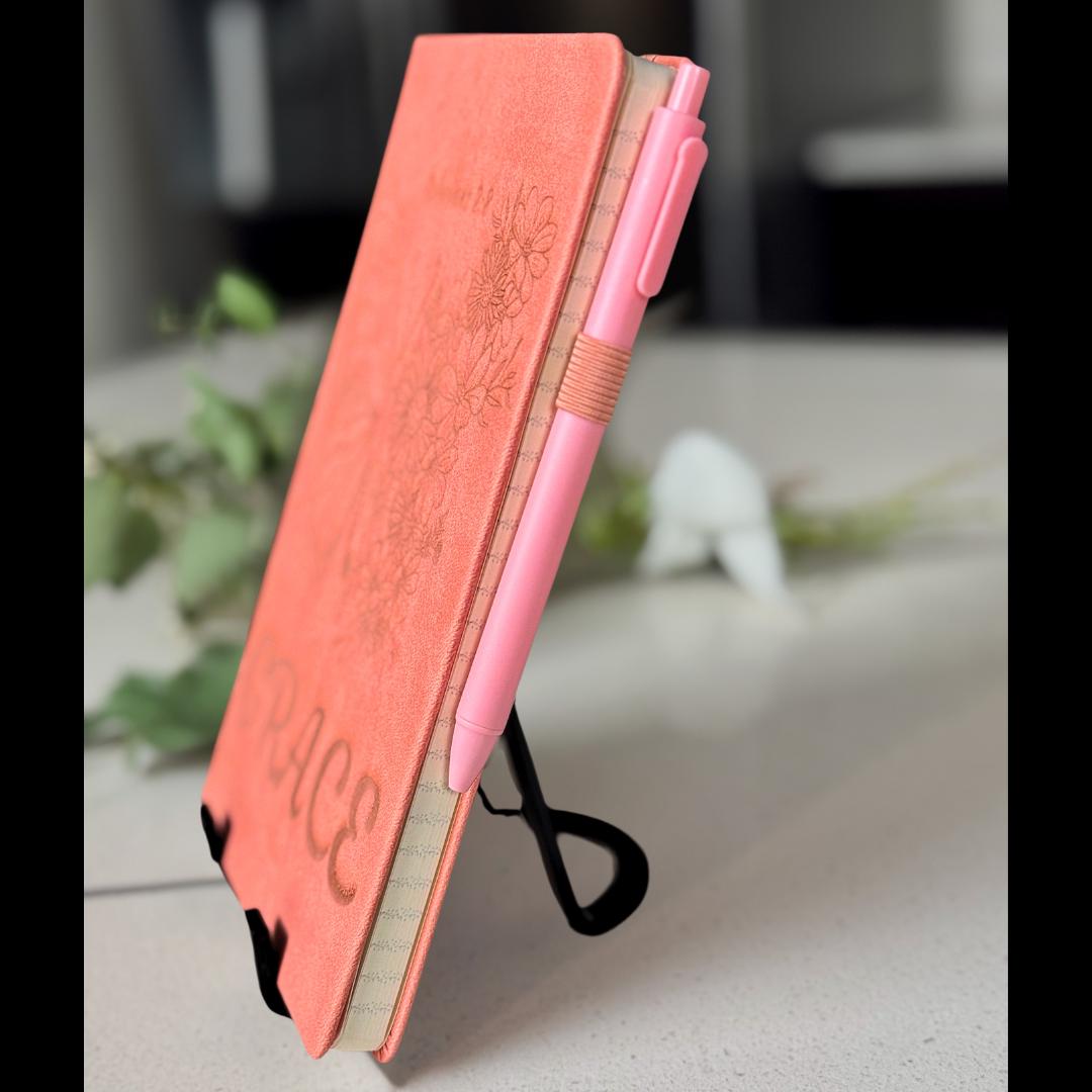 Flat lay of butterfly and floral Christian prayer journal, personalized scripture notebook with Bible verses for faith journaling, HisWord Designs faith gift.