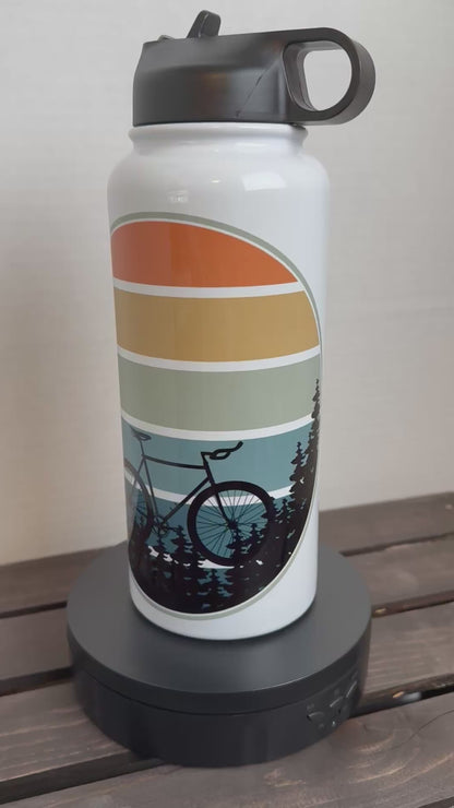 women bike riding bottle